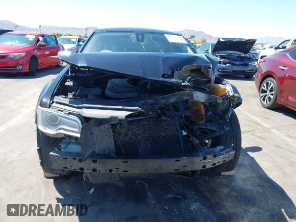 2016 Chrysler 300 C with VIN 2C3CCAEG8GH113057, listed as a IAAI auction lot 42052936 with 543,975 mi miles and . Bid and sale history available at DreamBid. Image 12.