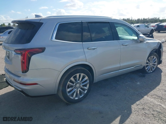 2020 Cadillac XT6 FWD Premium Luxury with VIN 1GYKPCRS7LZ164978, listed as a IAAI auction lot 41558920 with 87,416 mi miles. Bid and sale history available at carsss.com. Image 4.