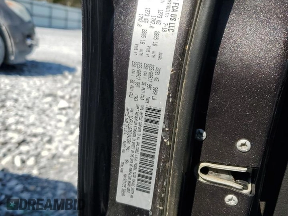 2019 Jeep Cherokee Latitude Plus z VIN 1C4PJLLB7KD241334, wystawiony jako Copart lot #52323575 z przebiegiem 82 570 mil mil oraz Szkoda całkowita • Salvage title. Historia ofert i sprzedaży dostępna na DreamBid. Obrazek 13.