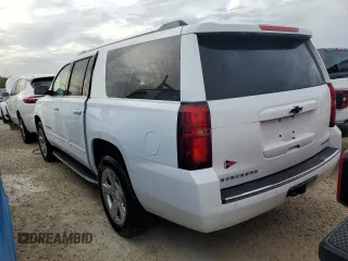 2019 Chevrolet Suburban Premier with VIN 1GNSKJKCXKR154480, listed as a Copart auction lot 77226834 with 24,683 mi miles and Non Repairable. Bid and sale history available at DreamBid. Image 2.