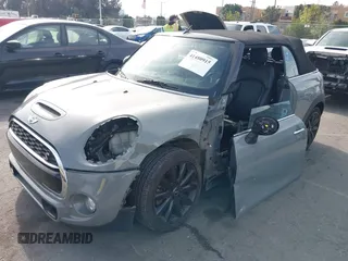 2017 MINI Convertible Cooper S z VIN WMWWG9C36H3C81439, wystawiony jako IAAI lot #41480915 z przebiegiem 64 104 mil mil oraz . Historia ofert i sprzedaży dostępna na DreamBid. Obrazek 18.