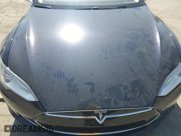 2014 Tesla Model S 60 с VIN 5YJSA1S13EFP29202, выставлен на аукционе Copart как лот 59046255 с пробегом Не указан миль и Списание • Salvage title. История ставок и продаж доступна на DreamBid. Изображение 11.