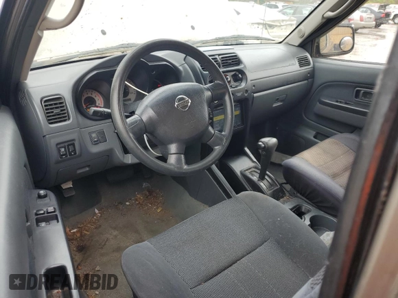2004 Nissan Frontier XE Desert Runner z VIN 1N6ED26T84C448365, wystawiony jako Copart lot #56487435 z przebiegiem 266 738 mil mil oraz Czysty tytuł • Clean title. Historia ofert i sprzedaży dostępna na DreamBid. Obrazek 8.