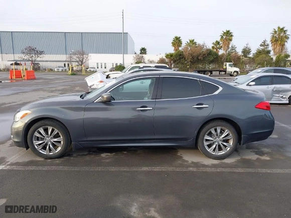 2013 Infiniti M37 with VIN JN1BY1AP8DM513615, listed as a IAAI auction lot 41572602 with 96,950 mi miles. Bid and sale history available at carsss.com. Image 14.