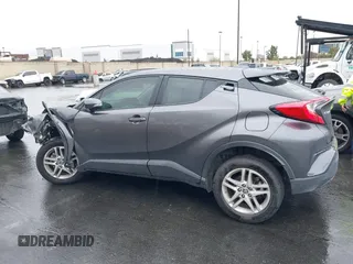 2021 Toyota C-HR LE with VIN JTNKHMBX9M1116408, listed as a IAAI auction lot 41567039 with 77,558 mi miles. Bid and sale history available at carsss.com. Image 15.