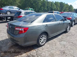 2012 Toyota Camry L z VIN 4T1BF1FK0CU506491, wystawiony jako IAAI lot #37661692 z przebiegiem 144 225 mil mil oraz . Historia ofert i sprzedaży dostępna na DreamBid. Obrazek 4.