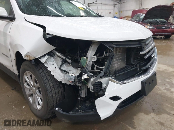 2018 Chevrolet Equinox LT z VIN 3GNAXSEVXJS587177, wystawiony jako IAAI lot #42322966 z przebiegiem 73 893 mil mil oraz . Historia ofert i sprzedaży dostępna na DreamBid. Obrazek 6.
