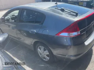 2011 Honda Insight LX z VIN JHMZE2H58BS005201, wystawiony jako Copart lot #57312335 z przebiegiem 195 020 mil mil oraz Czysty tytuł • Clean title. Historia ofert i sprzedaży dostępna na DreamBid. Obrazek 3.