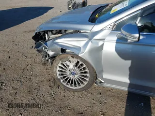 2016 Ford Fusion Titanium with VIN 3FA6P0K9XGR100723, listed as a IAAI auction lot 40627172 with 1 mi miles. Bid and sale history available at carsss.com. Image 6.