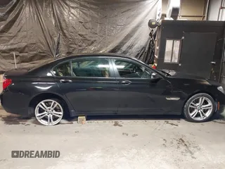 2014 BMW 7 Series ALPINA B7 xDrive with VIN WBAYF8C53ED141858, listed as a IAAI auction lot 40987098 with 128,404 mi miles and . Bid and sale history available at DreamBid. Image 13.