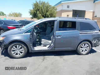 2014 Honda Odyssey EX-L z VIN 5FNRL5H61EB041962, wystawiony jako IAAI lot #42282873 z przebiegiem 134 884 mil mil oraz . Historia ofert i sprzedaży dostępna na DreamBid. Obrazek 6.