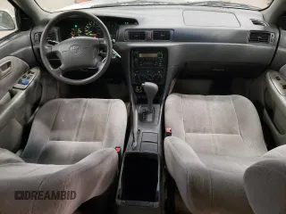 2000 Toyota Camry CE z VIN JT2BG22K1Y0483646, wystawiony jako Copart lot #53129705 z przebiegiem 187 418 mil mil oraz Szkoda całkowita • Salvage title. Historia ofert i sprzedaży dostępna na DreamBid. Obrazek 8.