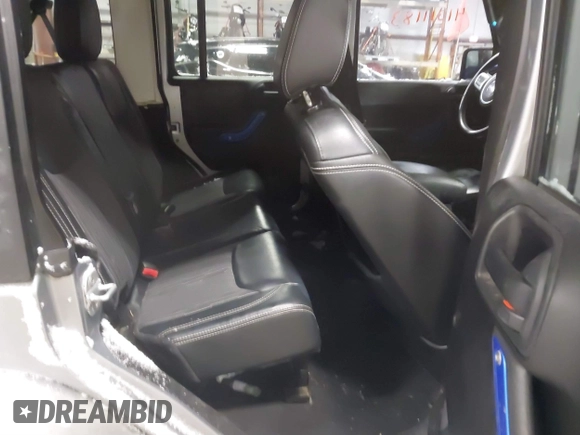 2013 Jeep Wrangler Unlimited Sport z VIN 1C4BJWDG3DL628784, wystawiony jako IAAI lot #41311183 z przebiegiem 125 118 mil mil oraz . Historia ofert i sprzedaży dostępna na DreamBid. Obrazek 8.