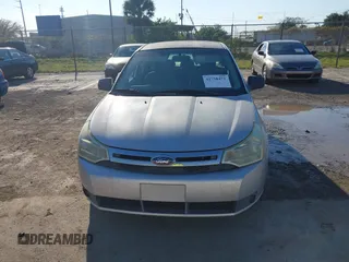 2009 Ford Focus S with VIN 1FAHP34N79W221813, listed as a IAAI auction lot 41758471 with 248,531 mi miles. Bid and sale history available at carsss.com. Image 12.