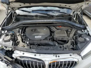 2019 BMW X1 xDrive28i with VIN WBXHT3C59K5L90317, listed as a Copart auction lot 61028125 with 46,789 mi miles and Salvage title. Bid and sale history available at DreamBid. Image 12.
