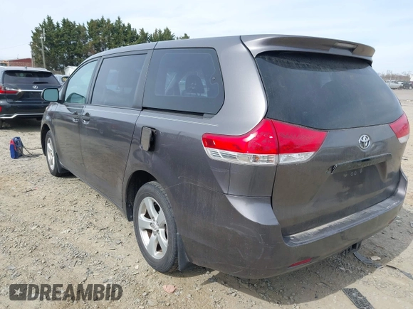 2012 Toyota Sienna with VIN 5TDKA3DC9CS011298, listed as a IAAI auction lot 41843980 with 158,787 mi miles and . Bid and sale history available at DreamBid. Image 3.