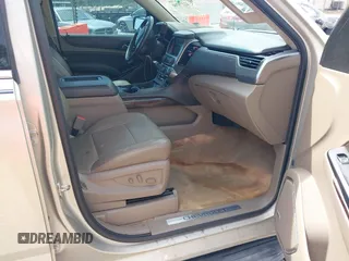 2015 Chevrolet Tahoe LT z VIN 1GNSCBKC7FR140125, wystawiony jako IAAI lot #42279760 z przebiegiem 201 335 mil mil oraz . Historia ofert i sprzedaży dostępna na DreamBid. Obrazek 5.