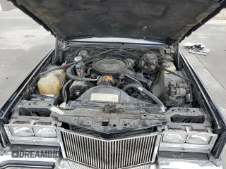 1985 Cadillac Eldorado z VIN 1G6EL578XFE640091, wystawiony jako Copart lot #71849374 z przebiegiem 30 631 mil mil oraz Szkody całkowita. Historia ofert i sprzedaży dostępna na DreamBid. Obrazek 12.