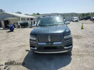 2021 Lincoln Navigator Black Label z VIN 5LMJJ3TT9MEL16717, wystawiony jako Copart lot #51939315 z przebiegiem 56 137 mil mil oraz Szkoda całkowita • Salvage title. Historia ofert i sprzedaży dostępna na DreamBid. Obrazek 11.