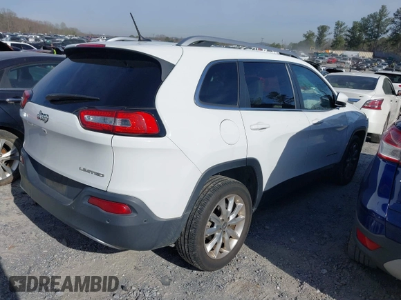 2015 Jeep Cherokee Limited with VIN 1C4PJLDB9FW677367, listed as a IAAI auction lot 41826477 with 125,648 mi miles and . Bid and sale history available at DreamBid. Image 4.