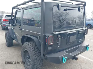 2014 Jeep Wrangler Sport с VIN 1C4AJWAG3EL288604, выставлен на аукционе IAAI как лот 41902520 с пробегом 159 116 миль миль и . История ставок и продаж доступна на DreamBid. Изображение 3.