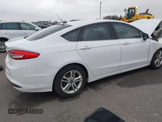 2018 Ford Fusion SE z VIN 3FA6P0H73JR212616, wystawiony jako IAAI lot #40869945 z przebiegiem 142 355 mil mil oraz . Historia ofert i sprzedaży dostępna na DreamBid. Obrazek 4.