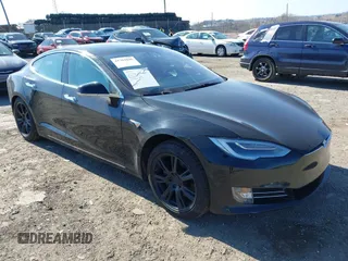 2020 Tesla Model S Long Range with VIN 5YJSA1E23LF381872, listed as a IAAI auction lot 41763046 with 96,720 mi miles. Bid and sale history available at carsss.com. Image 1.