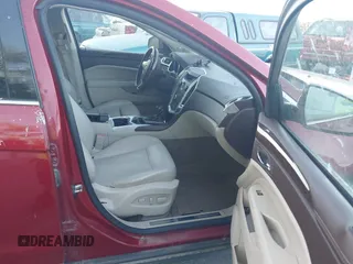 2011 Cadillac SRX Luxury Collection z VIN 3GYFNAEY2BS517192, wystawiony jako IAAI lot #42494074 z przebiegiem 191 094 mil mil oraz . Historia ofert i sprzedaży dostępna na DreamBid. Obrazek 5.