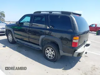 2001 Chevrolet Tahoe LT with VIN 1GNEK13T41R197657, listed as a IAAI auction lot 42164367 with 200,507 mi miles. Bid and sale history available at carsss.com. Image 3.