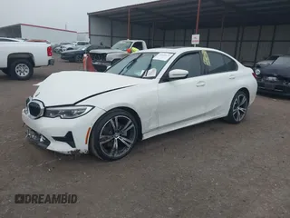 2022 BMW 3 Series 330i with VIN 3MW5R1J01N8C59980, listed as a IAAI auction lot 41445673 with 33,117 mi miles. Bid and sale history available at carsss.com. Image 2.