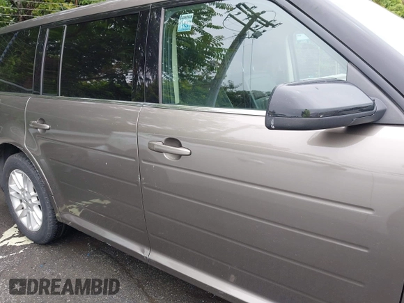 2014 Ford Flex SEL z VIN 2FMGK5C88EBD10549, wystawiony jako IAAI lot #42349426 z przebiegiem 123 903 mil mil oraz . Historia ofert i sprzedaży dostępna na DreamBid. Obrazek 13.