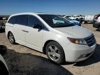 2013 Honda Odyssey Touring with VIN 5FNRL5H94DB068923, listed as a Copart auction lot 47269455 with 129,288 mi miles and Salvage Title. Bid and sale history available at carsss.com. Image 4.