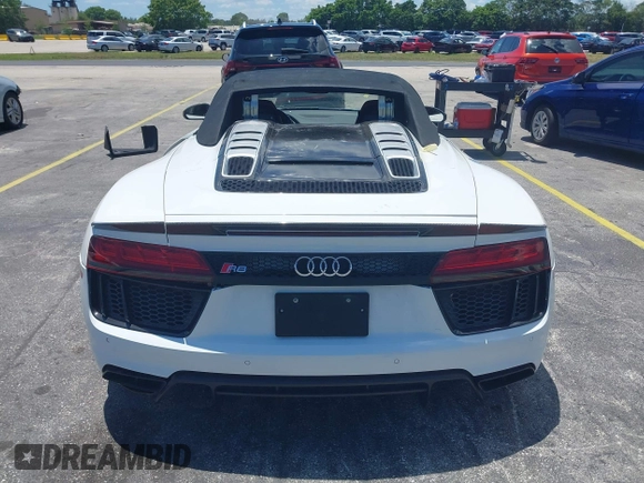 2017 Audi R8 z VIN WUAVACFX0H7903232, wystawiony jako IAAI lot #42247728 z przebiegiem 74 755 mil mil oraz . Historia ofert i sprzedaży dostępna na DreamBid. Obrazek 16.