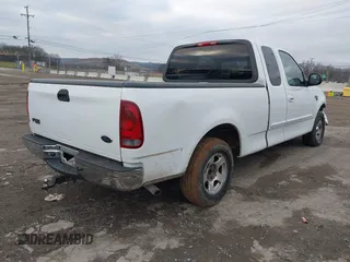 2003 Ford F-150 XL with VIN 1FTRX17W43NA31343, listed as a IAAI auction lot 41576625 with 1 mi miles. Bid and sale history available at carsss.com. Image 4.