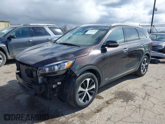 2016 Kia Sorento EX with VIN 5XYPHDA18GG039543, listed as a IAAI auction lot 42016459 with 64,121 mi miles and . Bid and sale history available at DreamBid. Image 2.