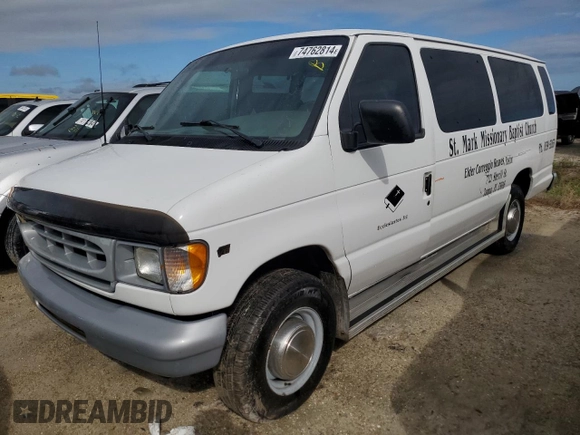 2000 Ford Econoline Passenger XL with VIN 1FBSS31L1YHB80264, listed as a Copart auction lot 74762814 with 61,702 mi miles and Salvage Title. Bid and sale history available at DreamBid. Image 1.