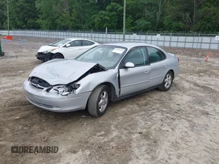 2003 Ford Taurus SE Standard with VIN 1FAHP53UX3G211556, listed as a IAAI auction lot 42208688 with 148,955 mi miles and . Bid and sale history available at DreamBid. Image 2.