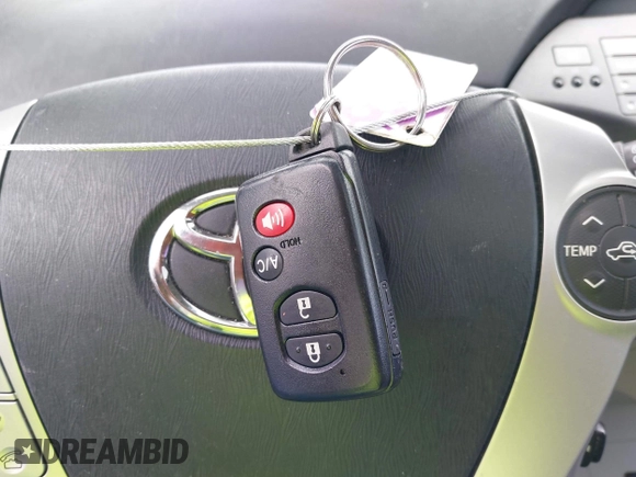 2012 Toyota Prius One with VIN JTDKN3DUXC1568215, listed as a IAAI auction lot 42058528 with 121,488 mi miles and . Bid and sale history available at DreamBid. Image 11.
