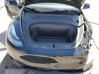 2024 Tesla Model Y z VIN 7SAYGDEDXRF991226, wystawiony jako Copart lot #62090255 z przebiegiem 42 853 mil mil oraz Szkoda całkowita • Salvage title. Historia ofert i sprzedaży dostępna na DreamBid. Obrazek 11.