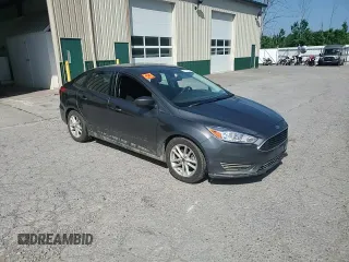2018 Ford Focus SE z VIN 1FADP3F25JL257815, wystawiony jako Copart lot #61978045 z przebiegiem 62 328 mil mil oraz Szkoda całkowita • Salvage title. Historia ofert i sprzedaży dostępna na DreamBid. Obrazek 14.