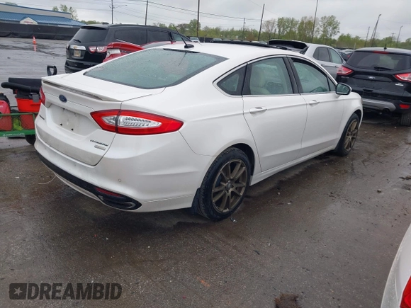 2016 Ford Fusion Titanium with VIN 3FA6P0K98GR369433, listed as a IAAI auction lot 42214785 with 64,918 mi miles and . Bid and sale history available at DreamBid. Image 4.