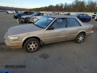 1990 Nissan Stanza GXE z VIN JN1FU21P9LX822087, wystawiony jako Copart lot #82967984 z przebiegiem 109 985 mil mil oraz Tytuł czysty. Historia ofert i sprzedaży dostępna na DreamBid. Obrazek 1.