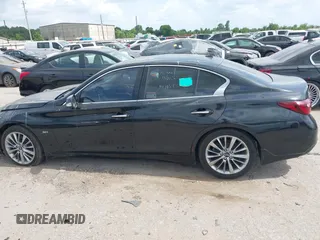 2020 Infiniti Q50 Sport z VIN JN1EV7AP1LM201269, wystawiony jako IAAI lot #42358333 z przebiegiem 69 368 mil mil oraz . Historia ofert i sprzedaży dostępna na DreamBid. Obrazek 14.