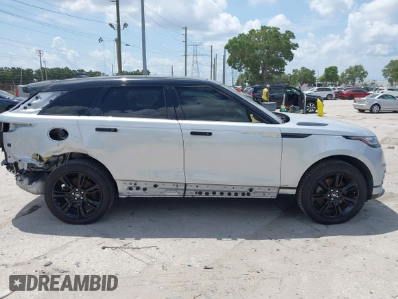 2021 Land Rover Range Rover Velar R-Dynamic S z VIN SALYT2EX9MA315965, wystawiony jako IAAI lot #42344448 z przebiegiem 66 819 mil mil oraz . Historia ofert i sprzedaży dostępna na DreamBid. Obrazek 14.