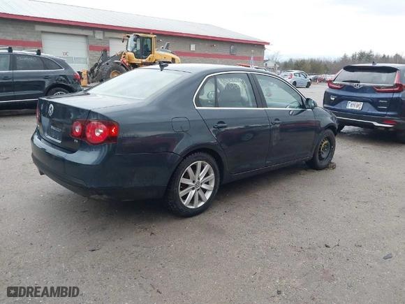 2009 Volkswagen Jetta Sedan SE with VIN 3VWRZ71K79M062217, listed as a IAAI auction lot 41906213 with NaN miles. Bid and sale history available at carsss.com. Image 4.