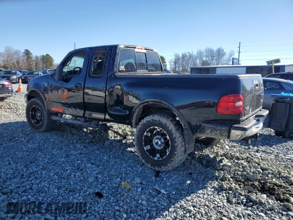 2000 Ford F-150 XL with VIN 2FTRX08L7YCA15407, listed as a Copart auction lot 86387684 with Not provided miles and Salvage title. Bid and sale history available at DreamBid. Image 2.