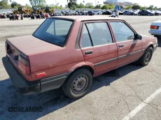 1986 Toyota Corolla with VIN JT2AE82EXG3386120, listed as a Copart auction lot 59397245 with 276,586 mi miles and Salvage title. Bid and sale history available at DreamBid. Image 3.