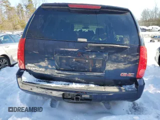 2009 GMC Yukon SLT w/4SB with VIN 1GKFK33059R146280, listed as a Copart auction lot 87421444 with 118,566 mi miles and Salvage Title. Bid and sale history available at carsss.com. Image 6.