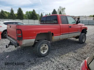 2000 Dodge 2500 z VIN 1B7KF23Z6YJ187490, wystawiony jako Copart lot #57873375 z przebiegiem 238 769 mil mil oraz Szkody całkowita. Historia ofert i sprzedaży dostępna na DreamBid. Obrazek 3.