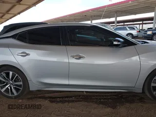 2020 Nissan Maxima SV z VIN 1N4AA6CV8LC361190, wystawiony jako IAAI lot #42225461 z przebiegiem 102 879 mil mil oraz . Historia ofert i sprzedaży dostępna na DreamBid. Obrazek 13.